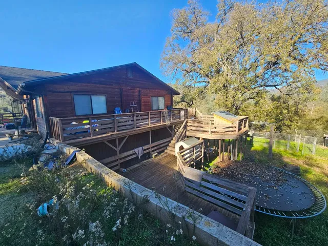 a view of a chairs and table on the wooden floor