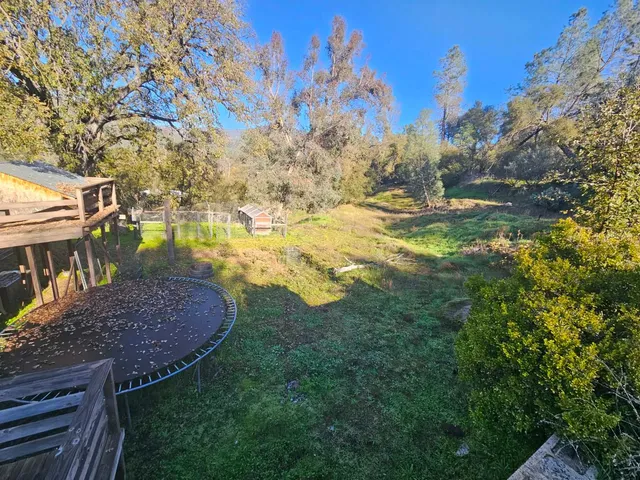 a view of outdoor space and yard