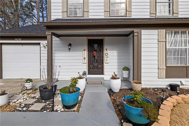 a view of a two chair in the patio