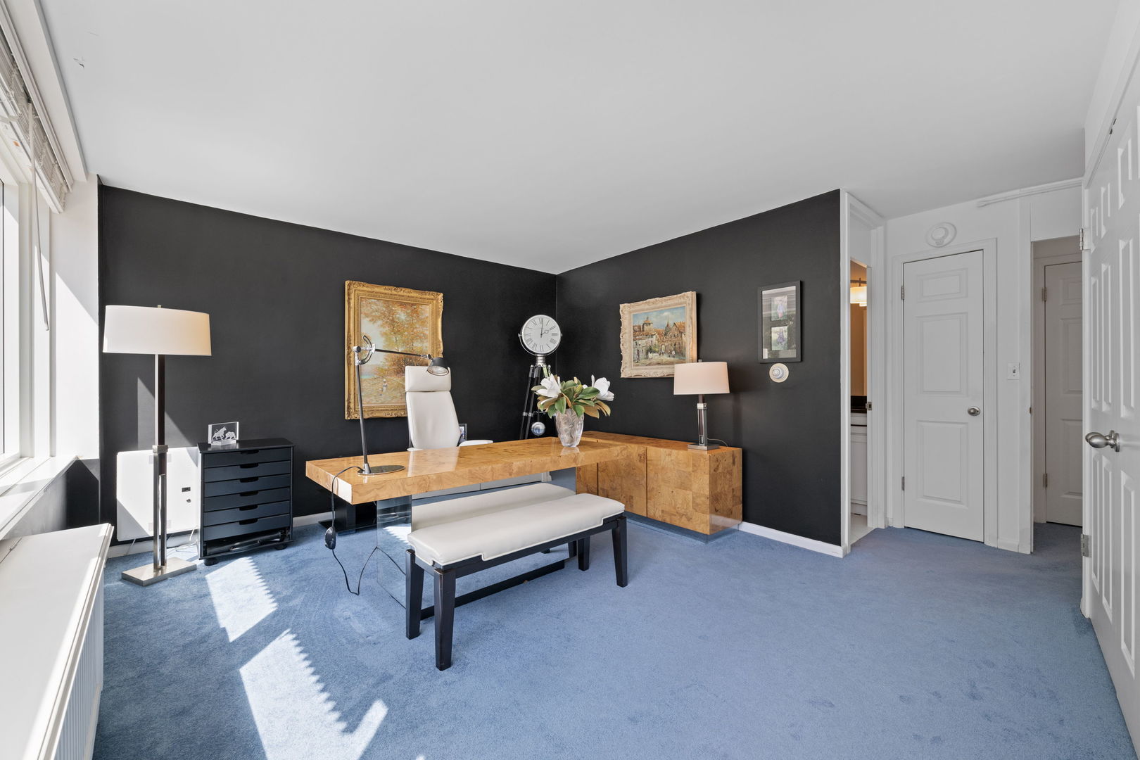 1630 Sheridan Road, Unit 2F Wilmette, IL 60091 - Photo 18 of 25 a living room with furniture a rug and a chandelier