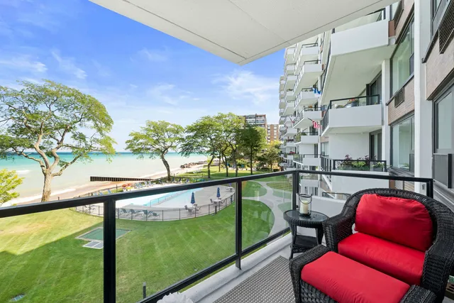a view of swimming pool from a balcony