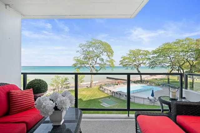 view of living room with furniture and floor to ceiling window