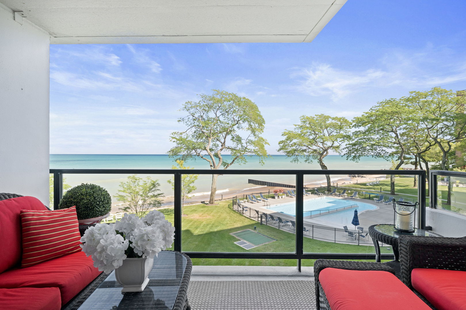 1630 Sheridan Road, Unit 2F Wilmette, IL 60091 - Photo 20 of 25 view of living room with furniture and floor to ceiling window