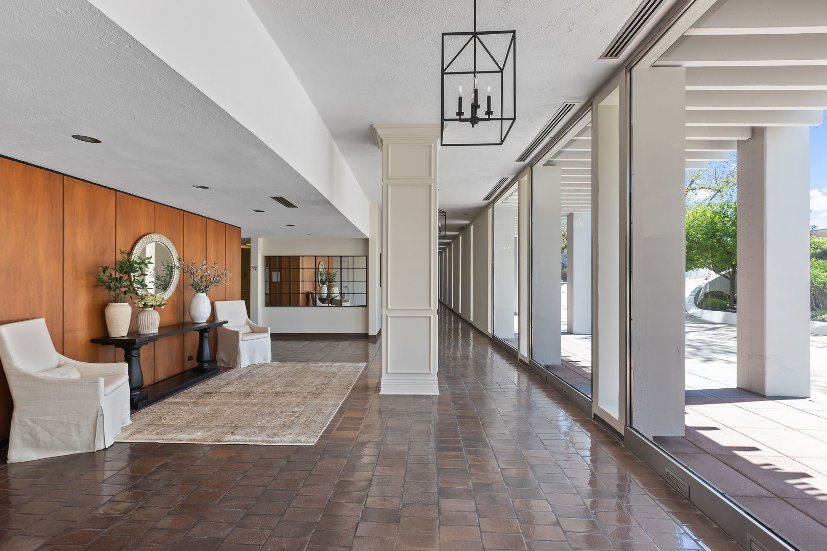 1630 Sheridan Road, Unit 2F Wilmette, IL 60091 - Photo 25 of 25 a view of a hallway with wooden floor and furniture