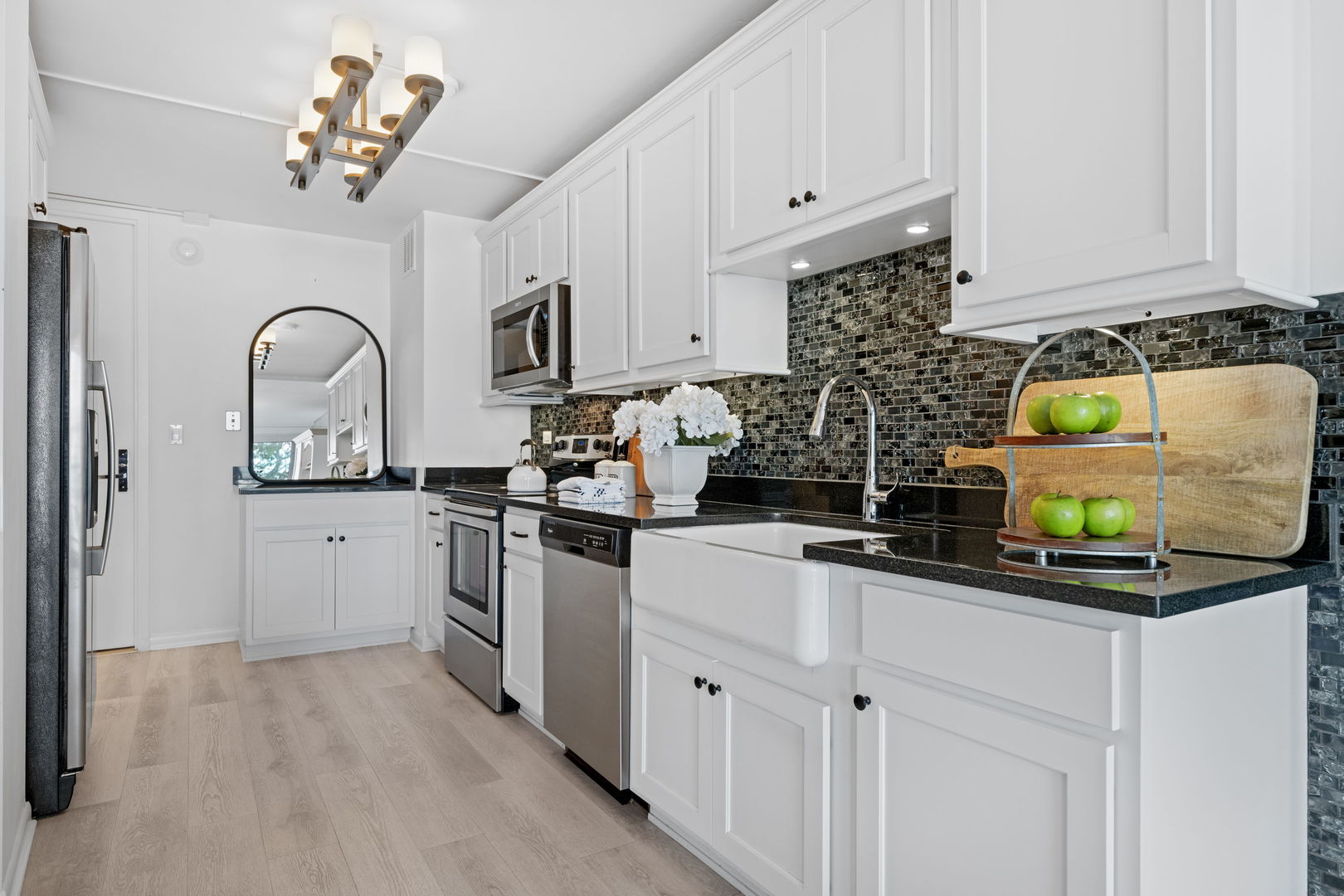 1630 Sheridan Road, Unit 2F Wilmette, IL 60091 - Photo 4 of 25 a kitchen with sink cabinets and appliances