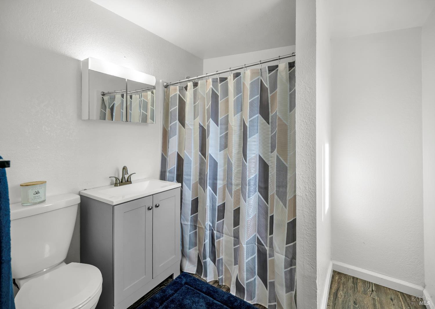 160 Thomas Street Ukiah, CA 95482 - Photo 17 of 26 a bathroom with a toilet a sink and a shower