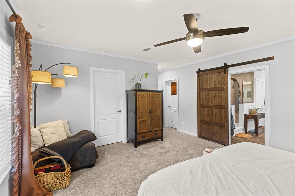 645 VZ County Road Ben Wheeler, TX 75754 - Photo 11 of 38 a spacious bedroom with a bed and furniture