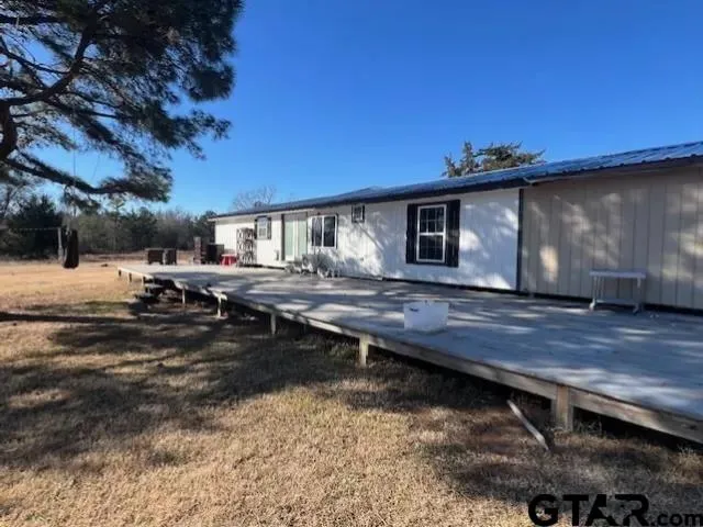 a view of house with wooden floor