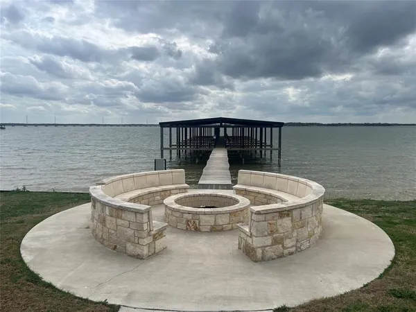 a view of a swimming pool with a terrace