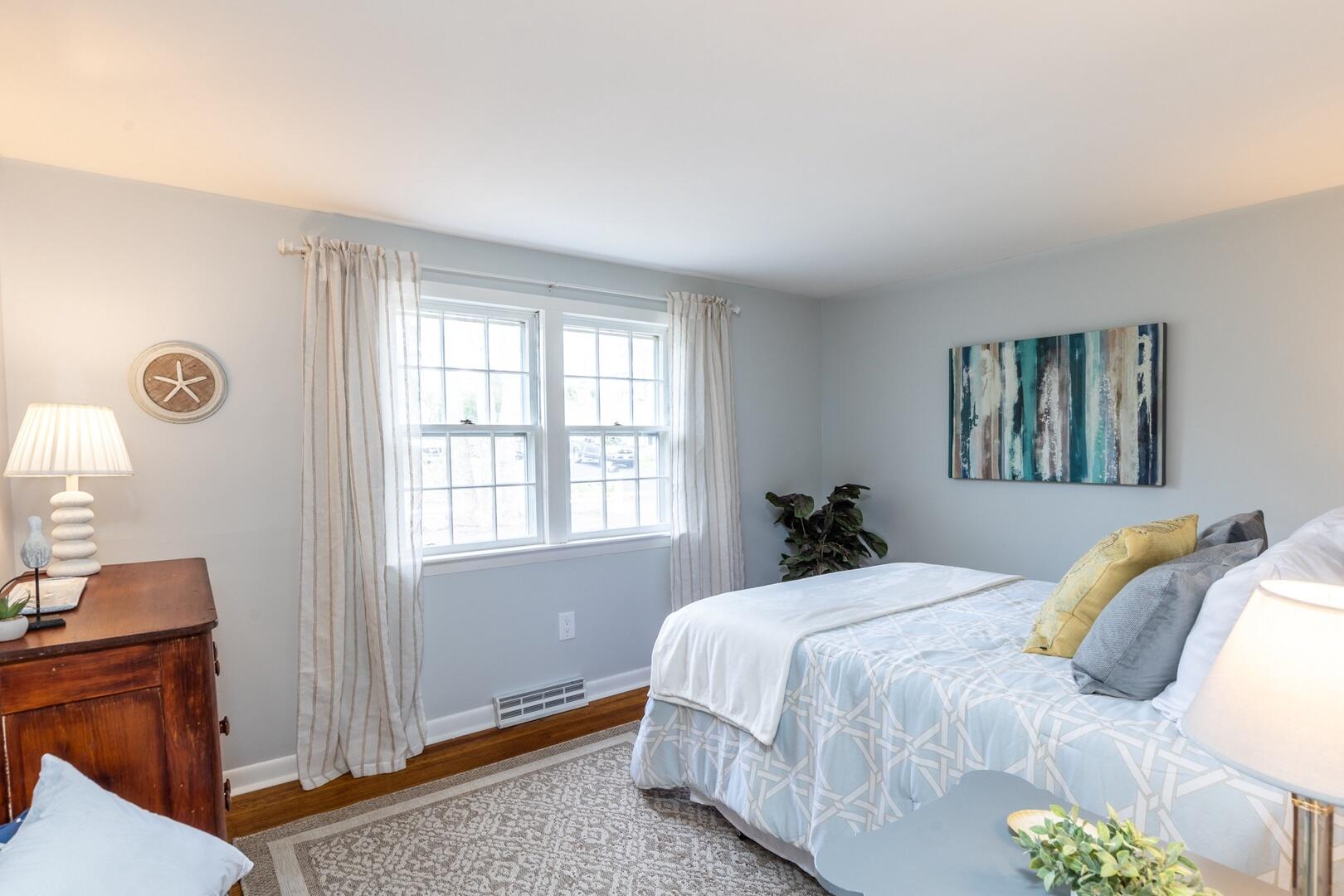 7 Jonquil Road Yarmouth Port, MA 02675 - Photo 11 of 16 a bedroom with a bed and a window