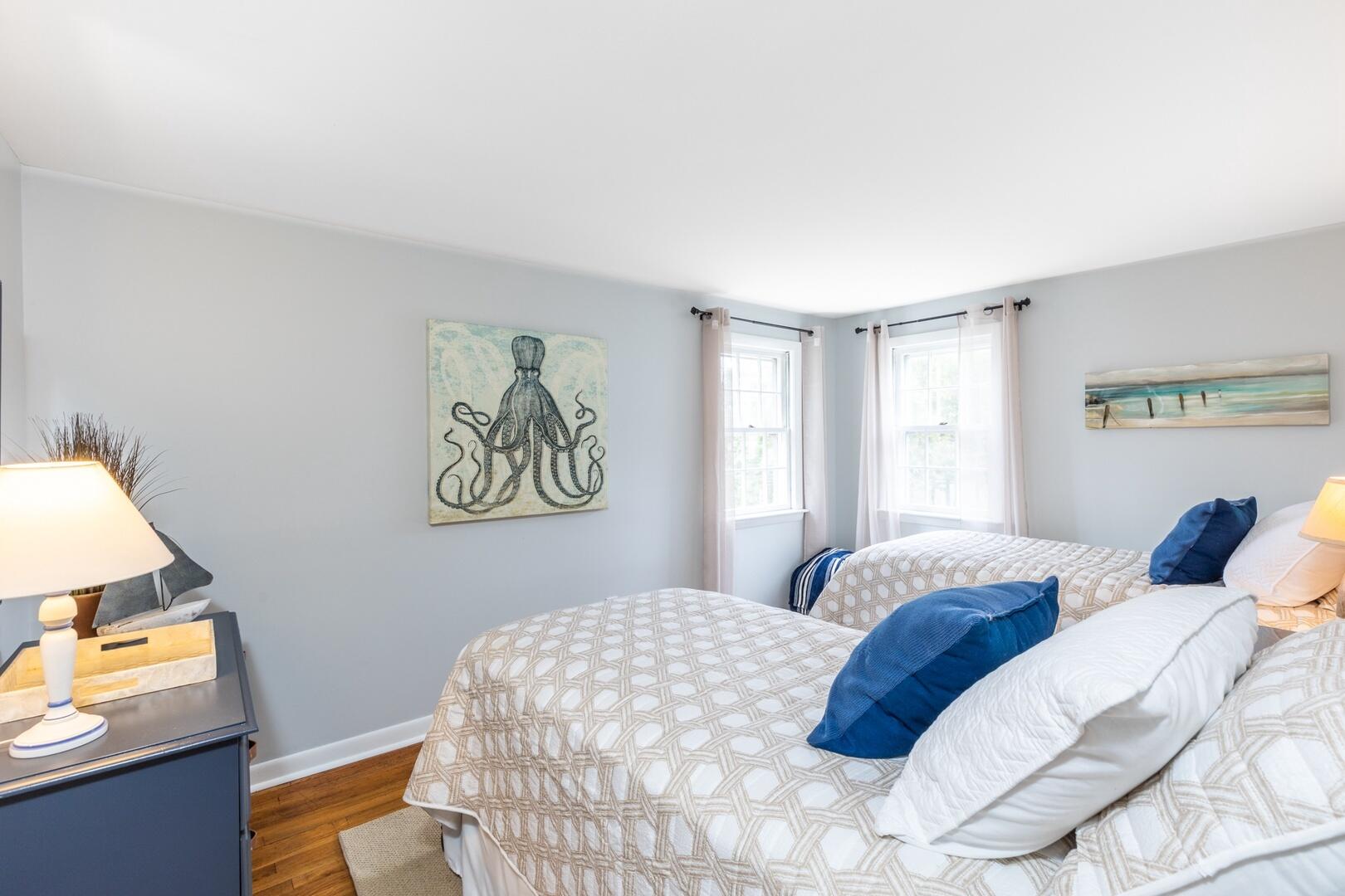 7 Jonquil Road Yarmouth Port, MA 02675 - Photo 12 of 16 a bedroom with a bed and a lamp on dresser