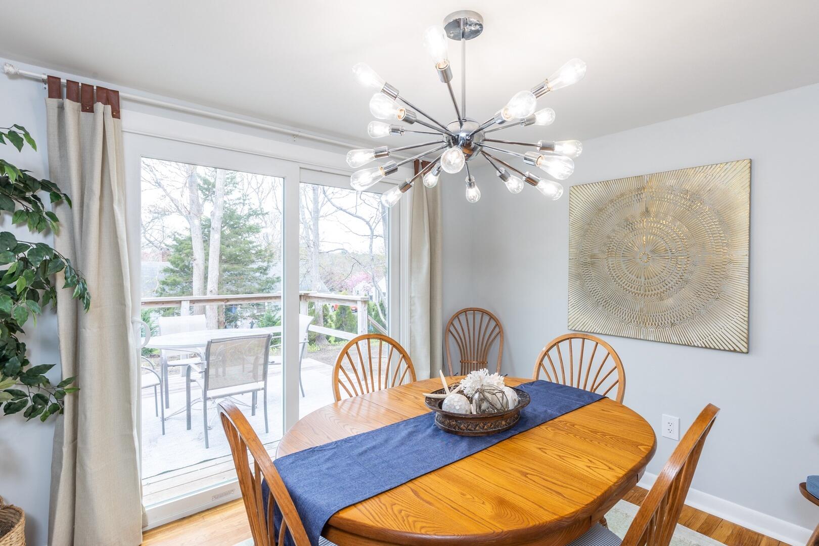 7 Jonquil Road Yarmouth Port, MA 02675 - Photo 14 of 16 a view of a dining room with furniture window and wooden floor