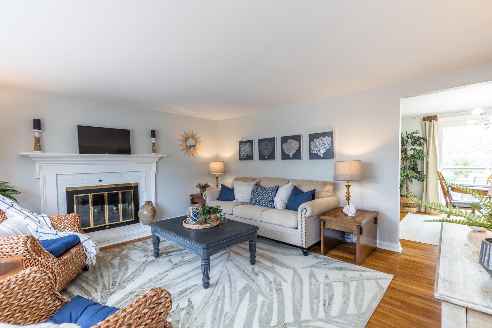 7 Jonquil Road Yarmouth Port, MA 02675 - Photo 4 of 16 a living room with furniture and a fireplace