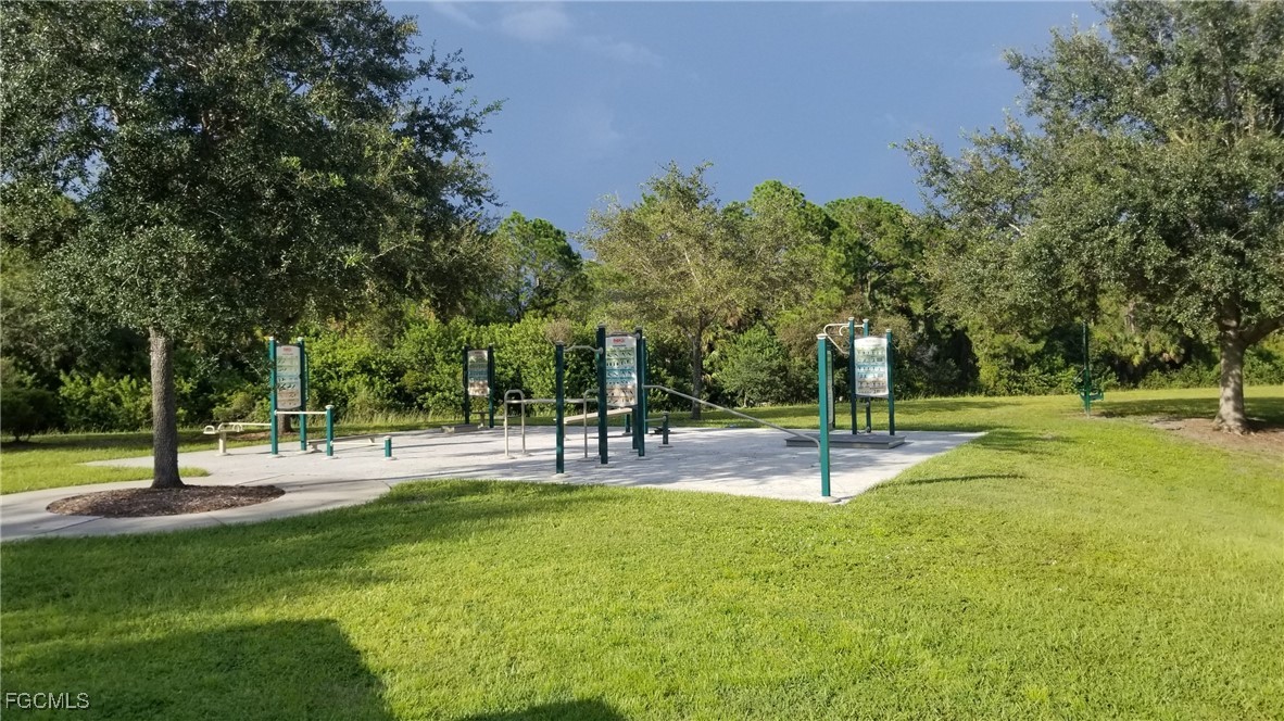 1147203405 Whaling Road North Port, FL 34288 - Photo 27 of 41 a view of a park with swings and slides