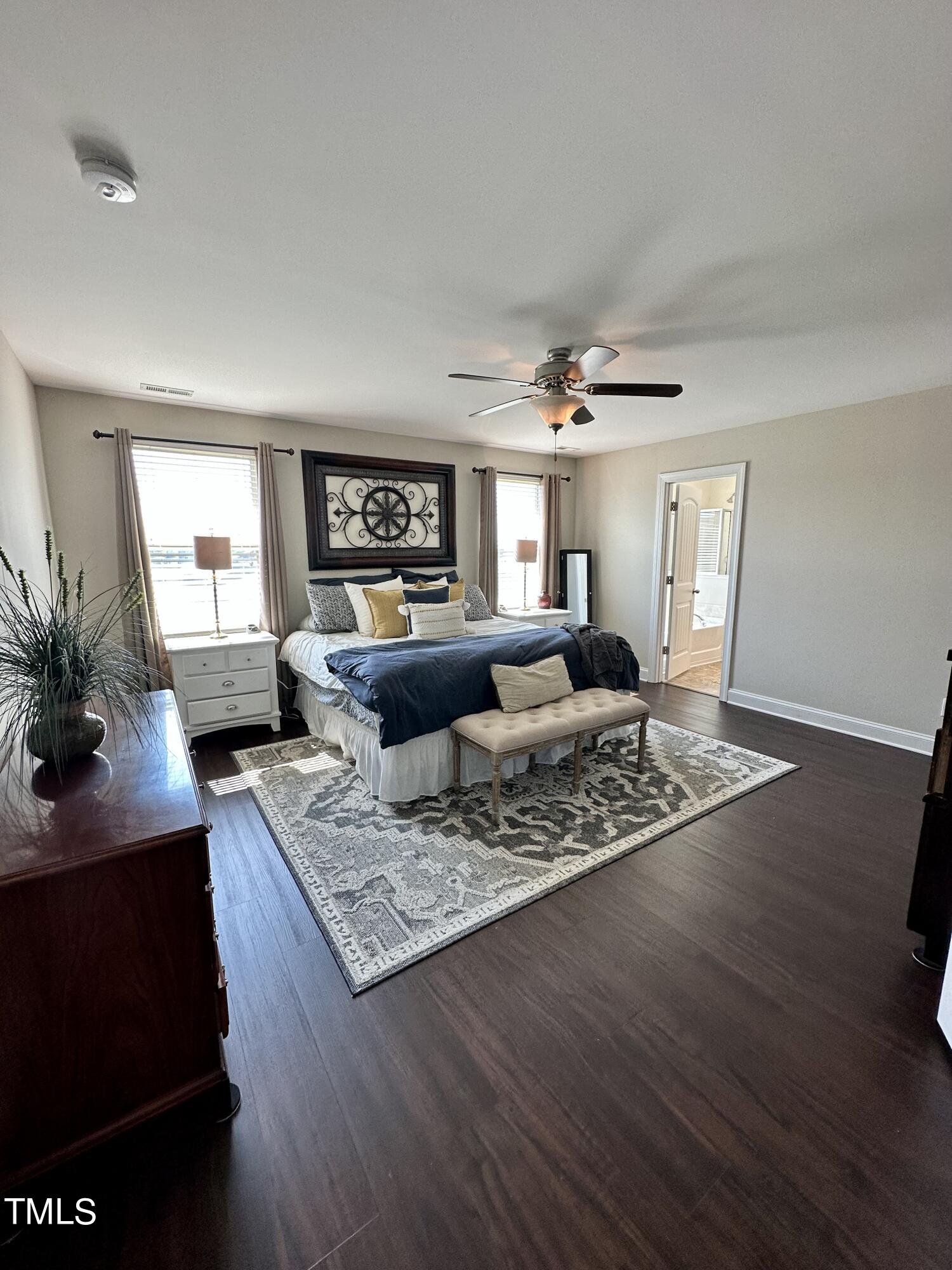 8305 Pin Cherry Drive Willow Spring, NC 27592 - Photo 40 of 60 a living room with furniture and a wooden floor
