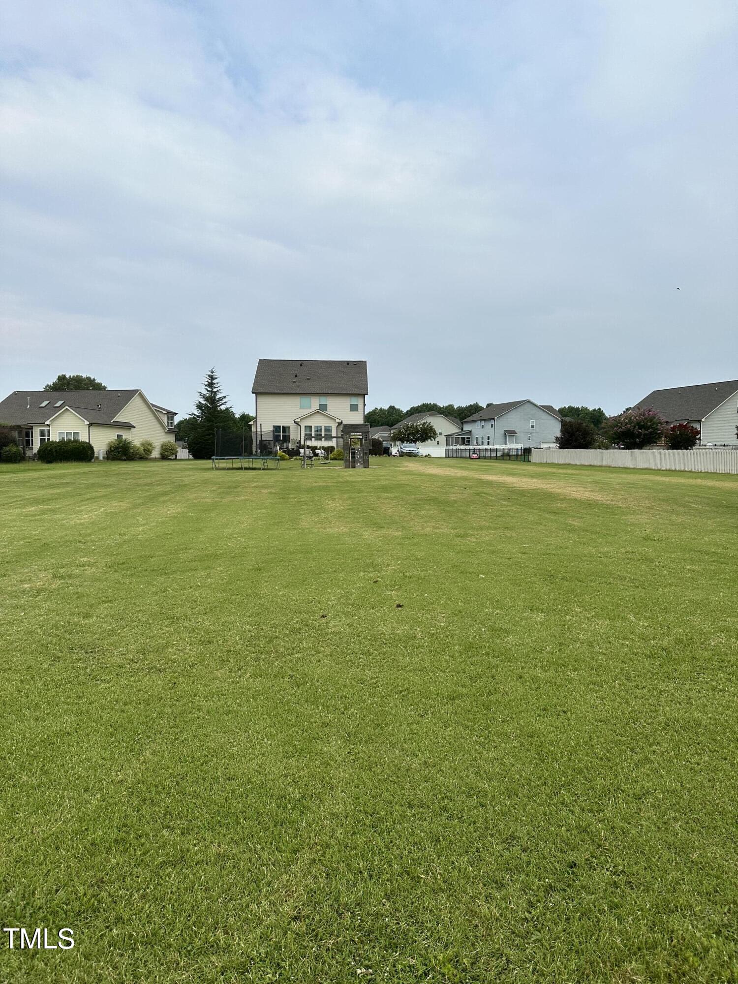 8305 Pin Cherry Drive Willow Spring, NC 27592 - Photo 57 of 60 a view of a city and an ocean view