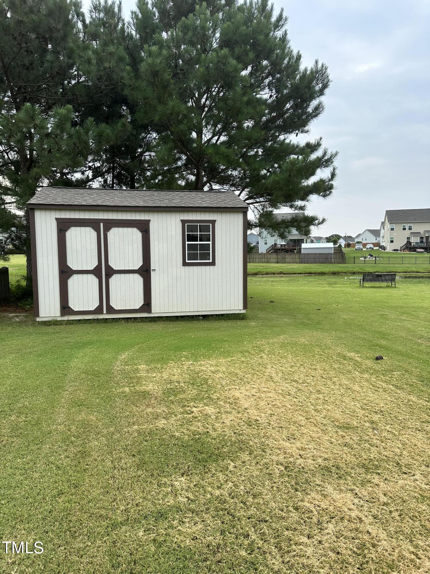 8305 Pin Cherry Drive Willow Spring, NC 27592 - Photo 58 of 60 a view of a house with a yard