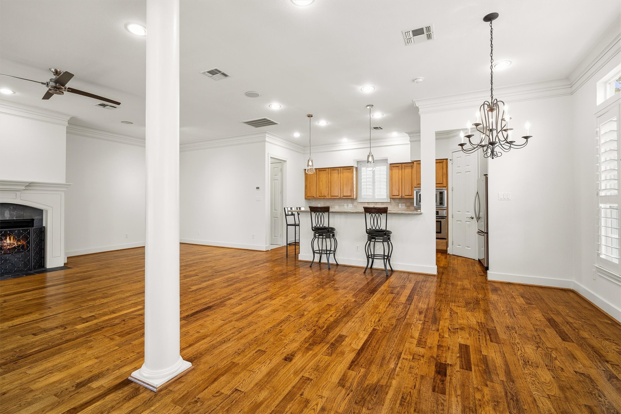 5507 Val Verde Street Houston, TX 77056 - Photo 17 of 42 a view of a kitchen with dining table & chairs