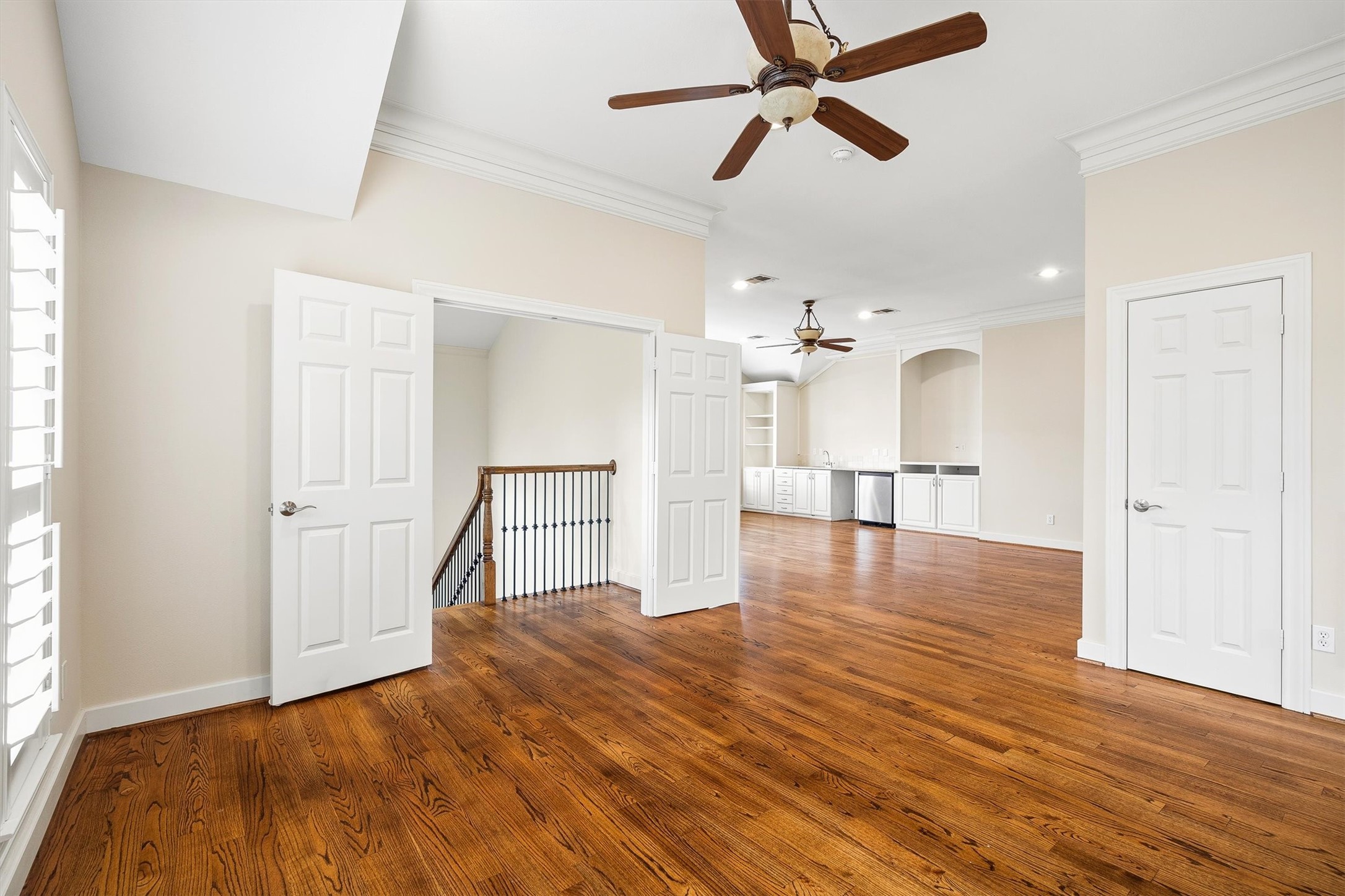 5507 Val Verde Street Houston, TX 77056 - Photo 29 of 42 a view of empty room with wooden floor and fan