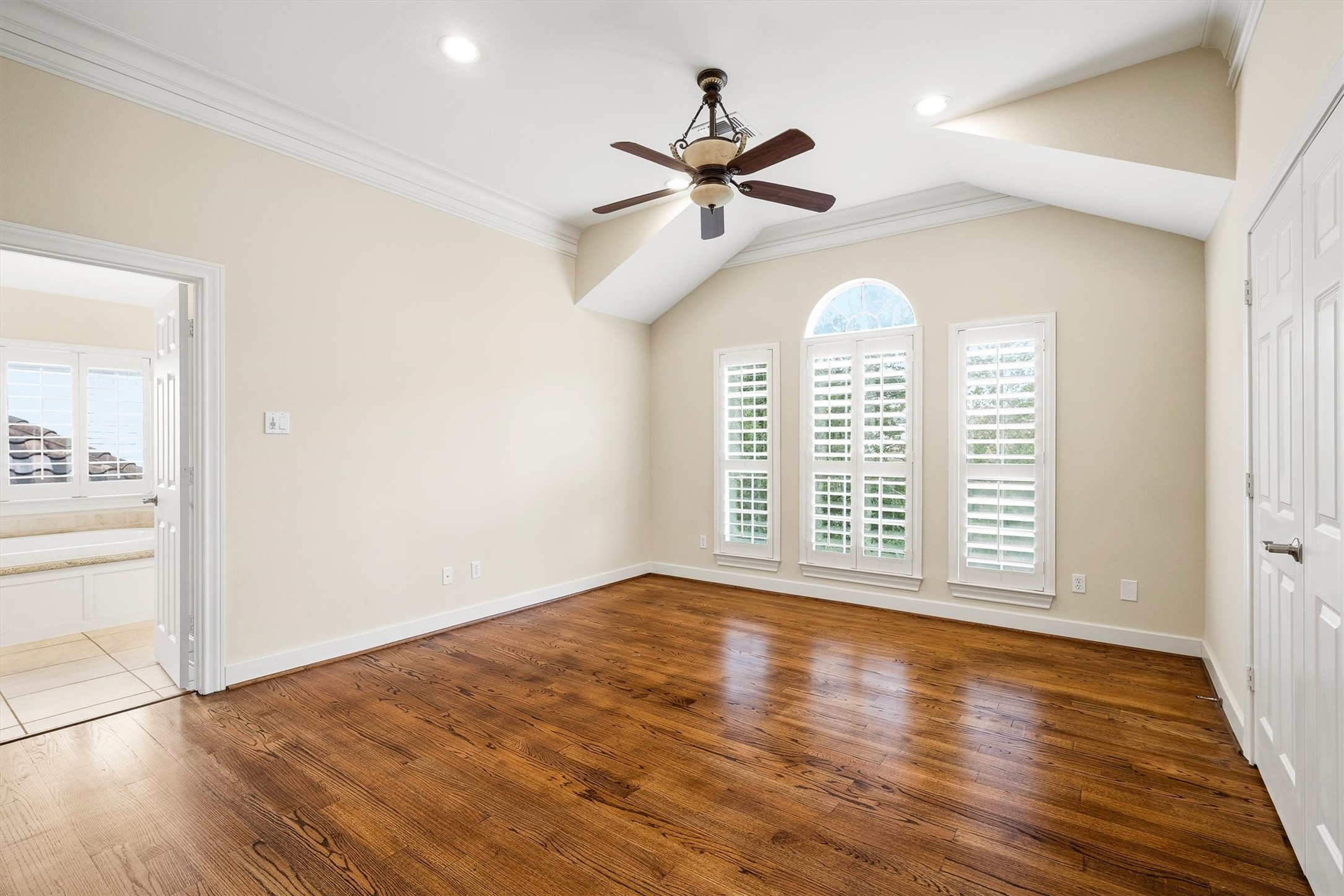 5507 Val Verde Street Houston, TX 77056 - Photo 30 of 42 a view of empty room with wooden floor and fan