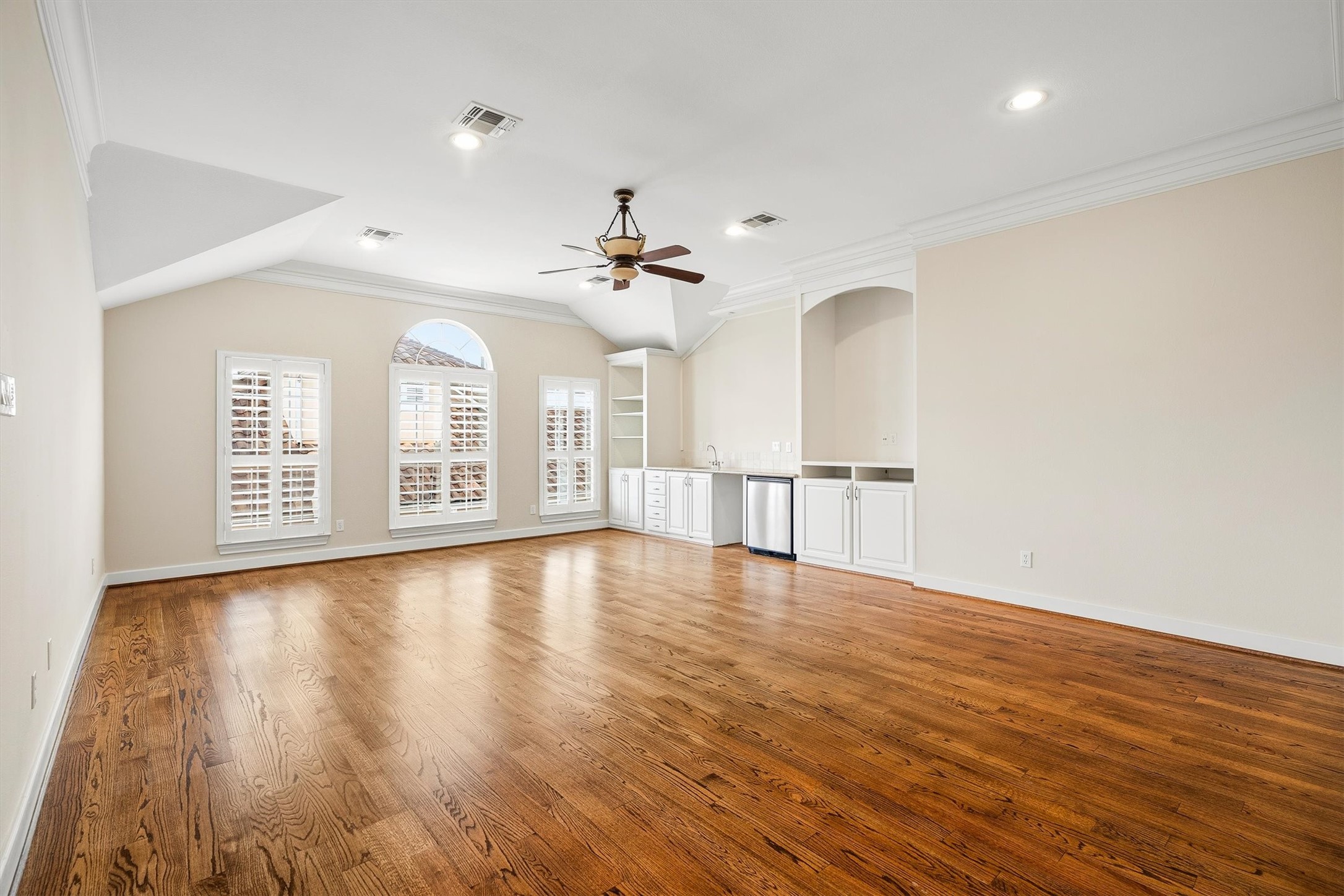 5507 Val Verde Street Houston, TX 77056 - Photo 31 of 42 a view of an empty room with window and wooden floor