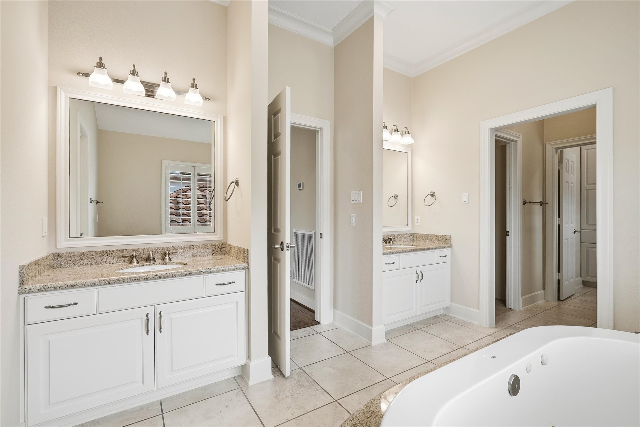 5507 Val Verde Street Houston, TX 77056 - Photo 37 of 42 a spacious bathroom with a tub sink and mirror