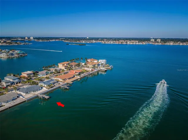 a view of a lake with a big yard