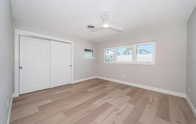 an aerial view of a house with a garden