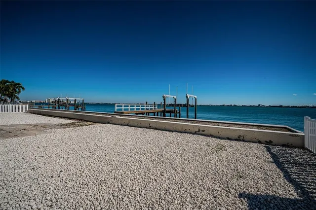 a view of a balcony with ocean