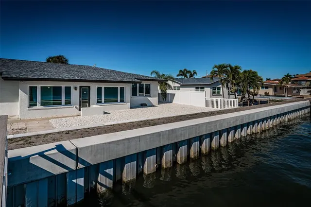 an aerial view of a city with lawn chairs