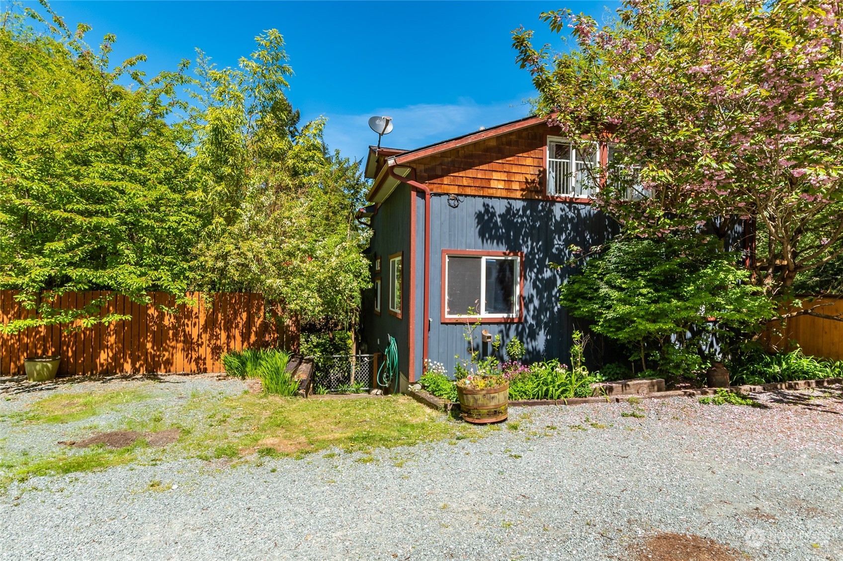 2215 Goss Ridge Road Freeland, WA 98249 - Photo 3 of 40 a front view of house with yard