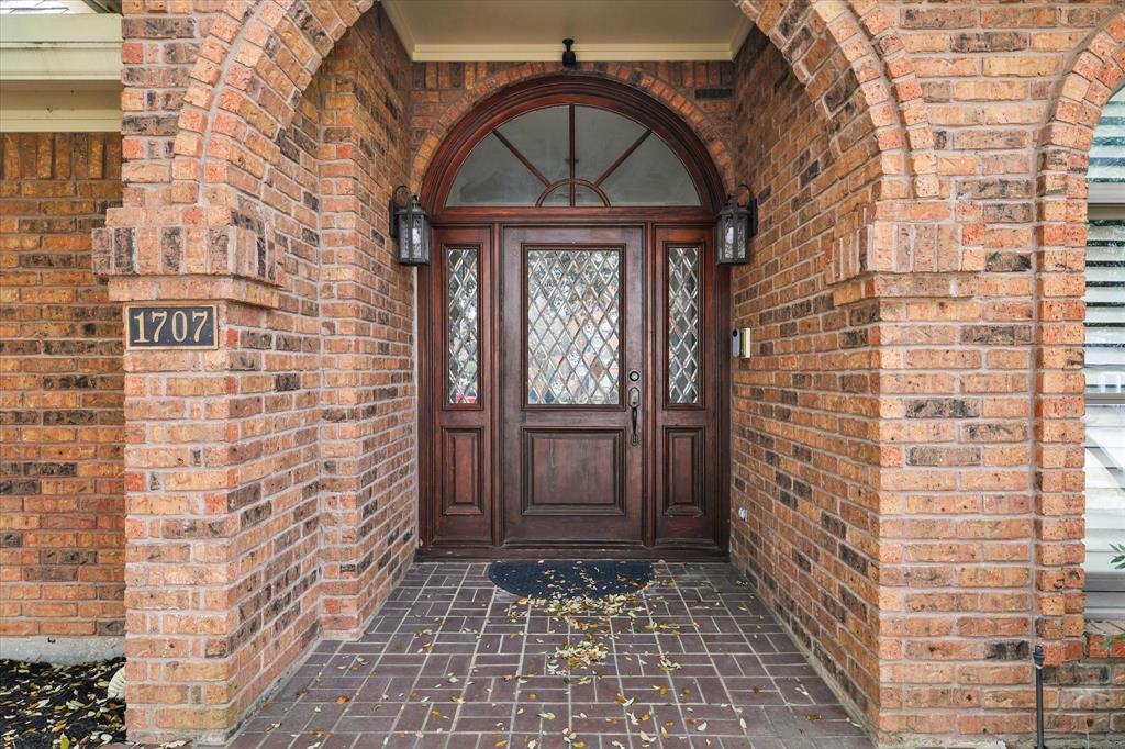 1707 Timber Ridge Circle Corinth, TX 76210 - Photo 1 of 1 a view of entryway with a front door