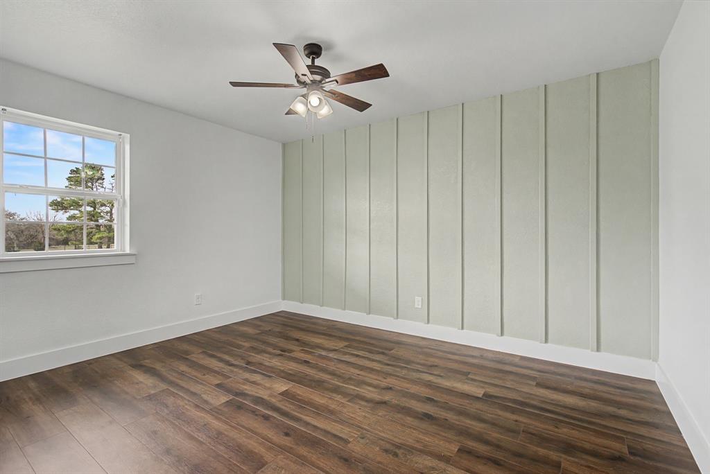 192 Riverside Drive Decatur, TX 76234 - Photo 23 of 32 a view of an empty room with wooden floor