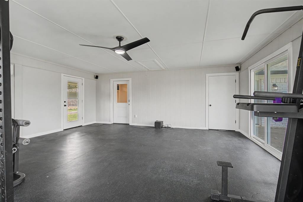 192 Riverside Drive Decatur, TX 76234 - Photo 28 of 32 a view of empty room with wooden floor and fan