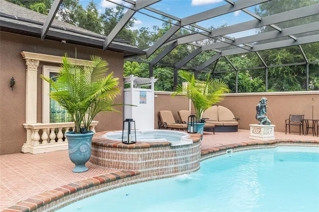 a kitchen with stainless steel appliances a stove sink and cabinets