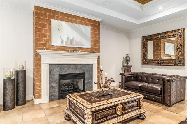 a view of a kitchen with fridge and workspace