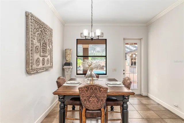 a front view of a house with a garden and plants