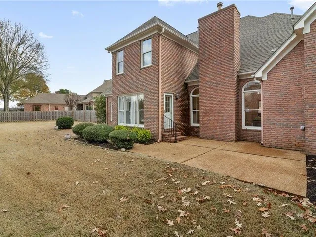 a view of a house with a patio