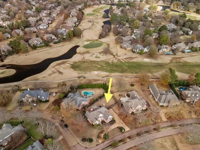 a house with river in front of it