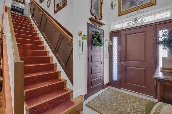a view of an entryway with staircase