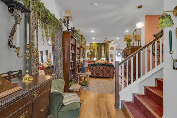 a view of a living room and entryway