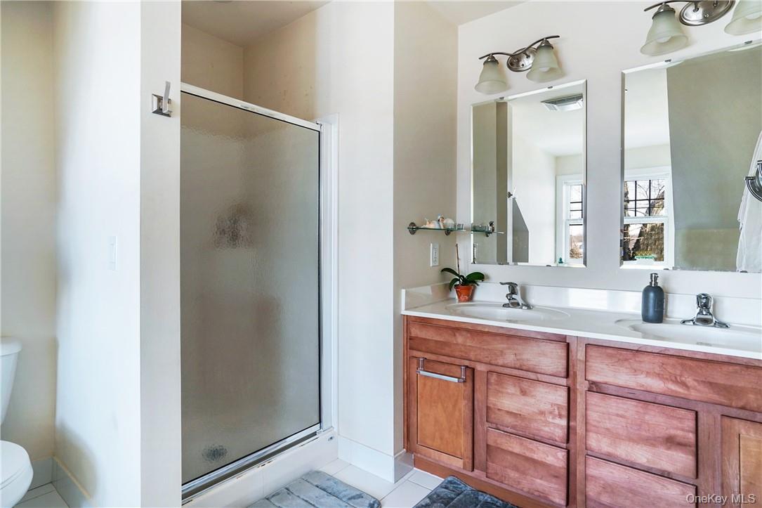 297 West Post Road White Plains, NY 10606 - Photo 17 of 23 Double vanities, shower and tub