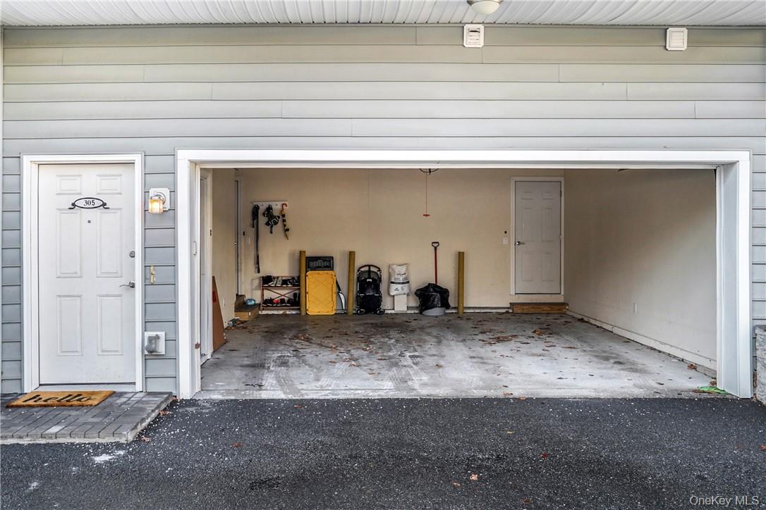 297 West Post Road White Plains, NY 10606 - Photo 3 of 23 Unit door and garage