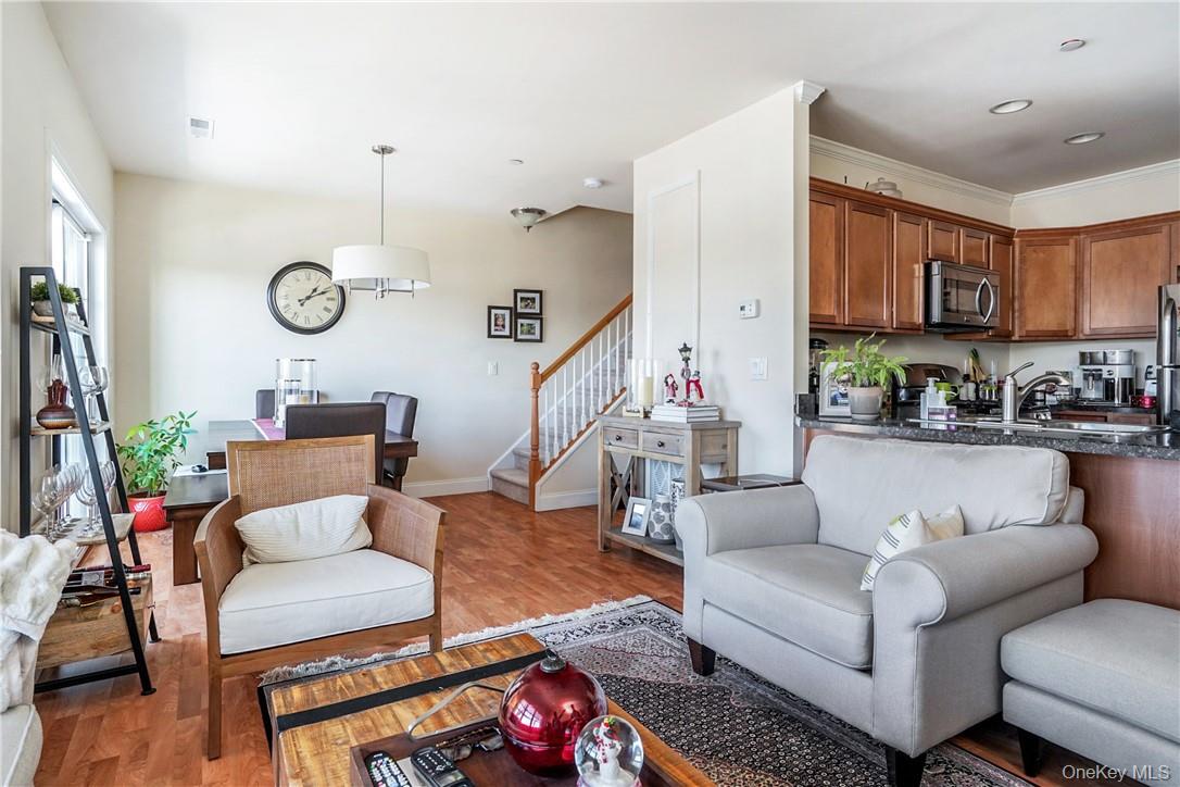 297 West Post Road White Plains, NY 10606 - Photo 7 of 23 View of open kitchen, dining area and stairs