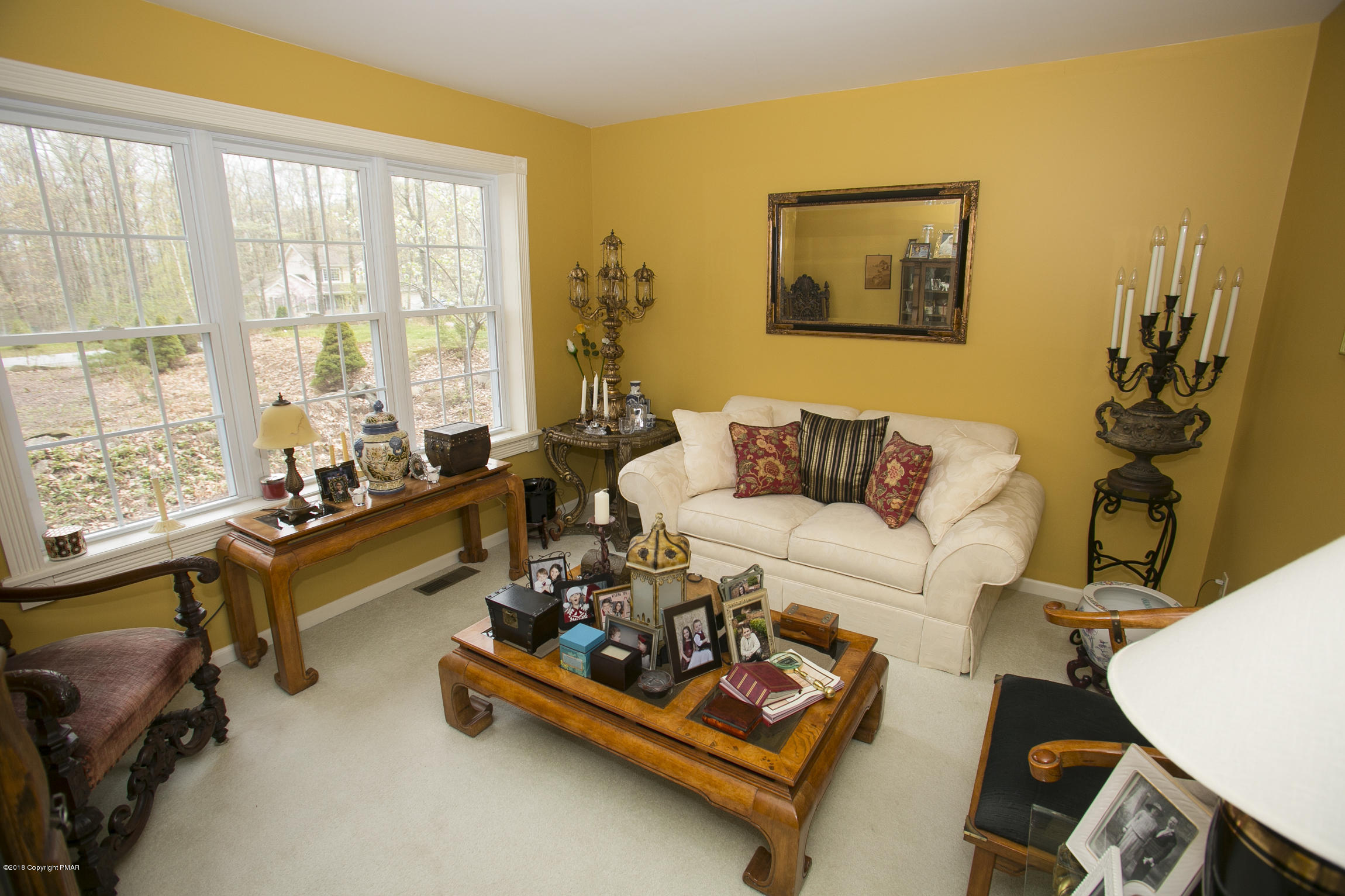 223 Cactus Road Stroudsburg, PA 18360 - Photo 13 of 38 a living room with furniture and a table
