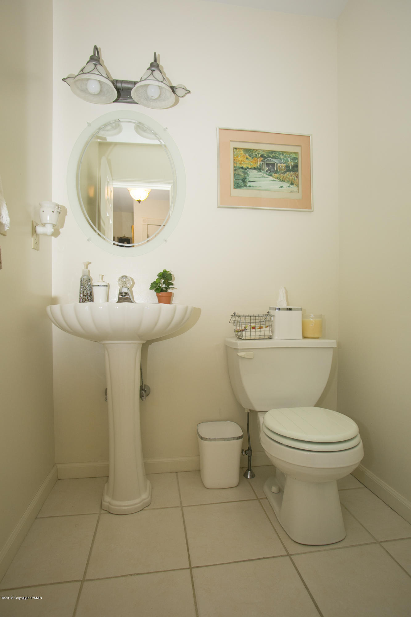 223 Cactus Road Stroudsburg, PA 18360 - Photo 15 of 38 a bathroom with a sink toilet and mirror