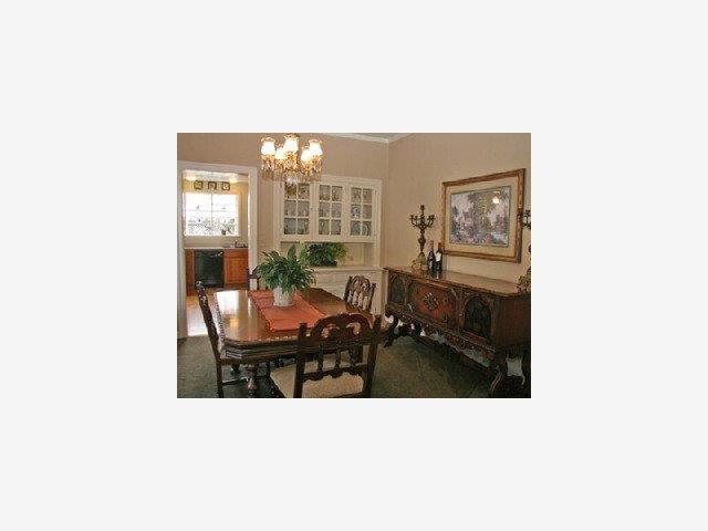 1227 Rhus Street San Mateo, CA 94402 - Photo 3 of 9 a living room with furniture and a floor to ceiling window