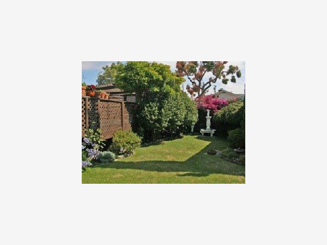 1227 Rhus Street San Mateo, CA 94402 - Photo 5 of 9 a black and white photo of a room