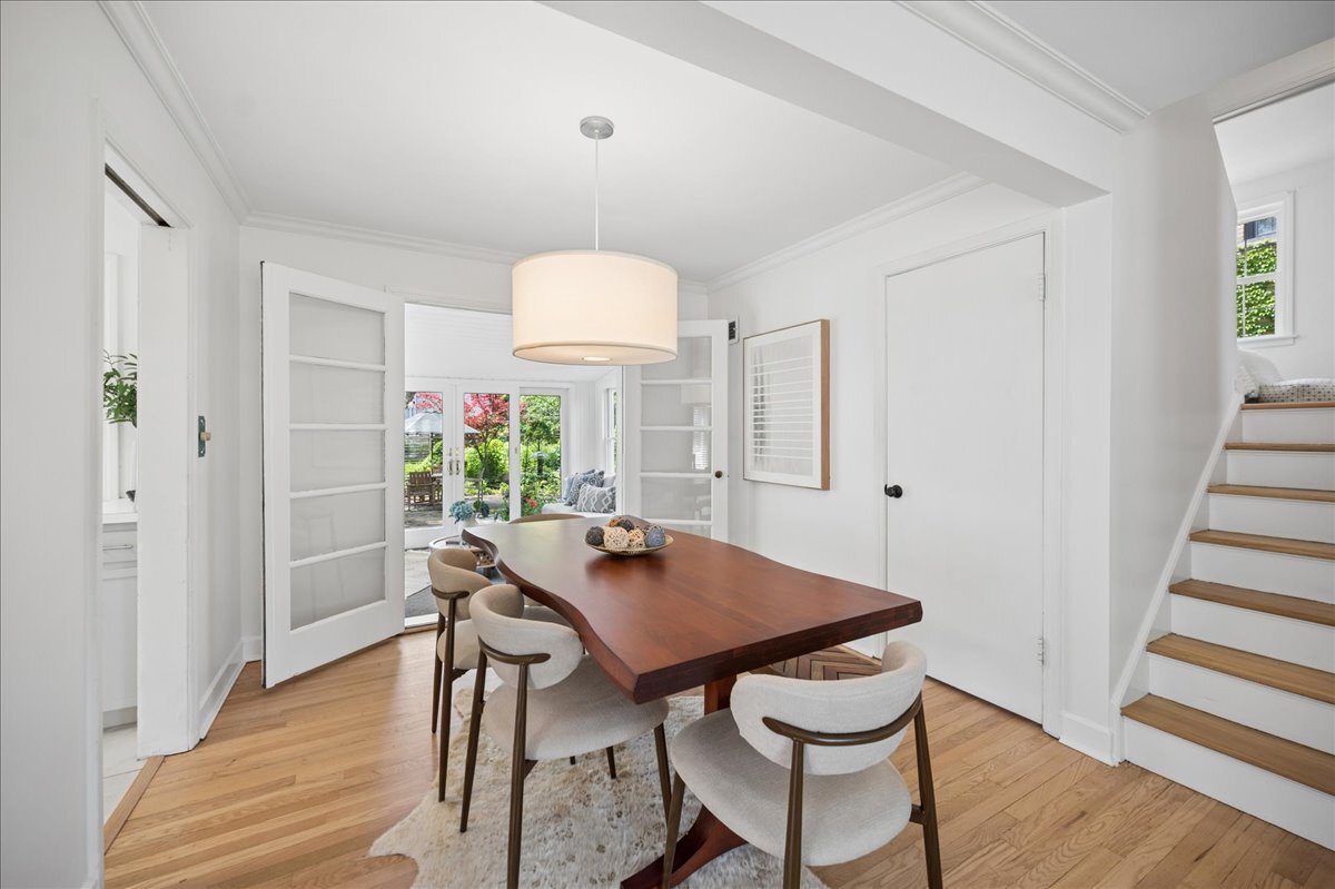 712 Juniper Road Glenview, IL 60025 - Photo 10 of 33 a view of a dining room with furniture and wooden floor