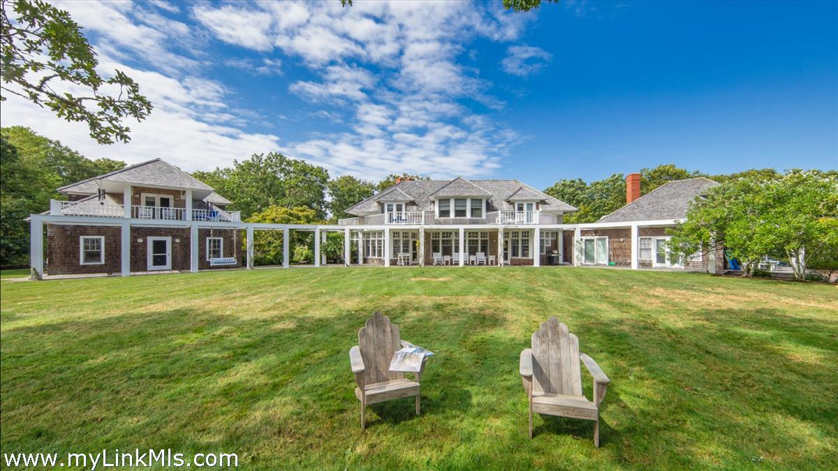 32 Boldwater Road Edgartown, MA 02539 - Photo 2 of 55 a front view of a house with a garden